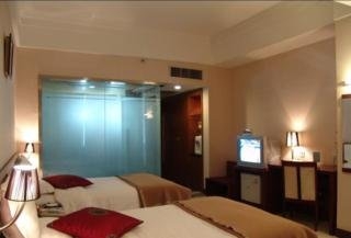 Imagen de la habitación del Hotel Golden Spring, Kunming. Foto 8