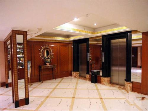 Imagen de la habitación del Hotel Golden Star Holiday Shijiazhuang. Foto 10