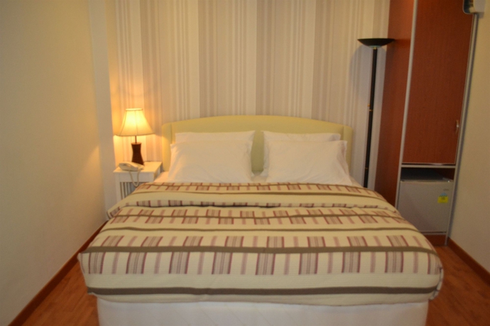 Imagen de la habitación del Hotel Golden Suites. Foto 7