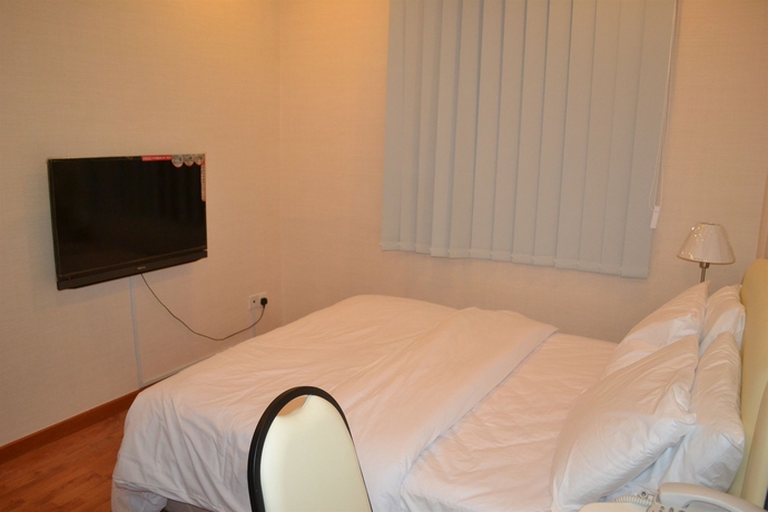 Imagen de la habitación del Hotel Golden Suites. Foto 12