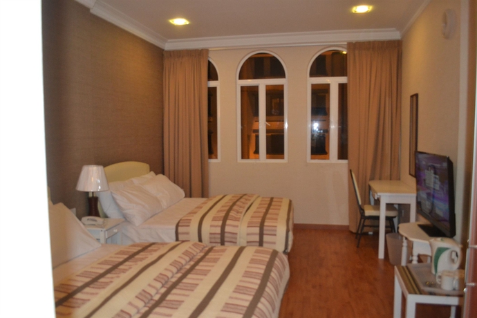 Imagen de la habitación del Hotel Golden Suites. Foto 13