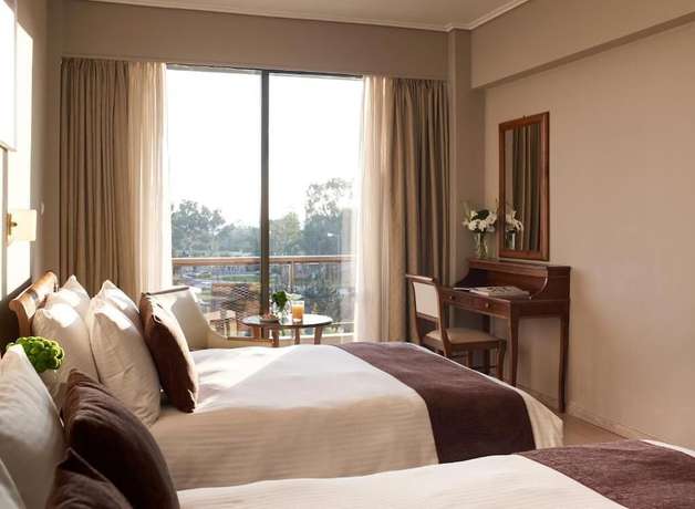 Imagen de la habitación del Hotel Golden Sun, Fenikounta. Foto 17