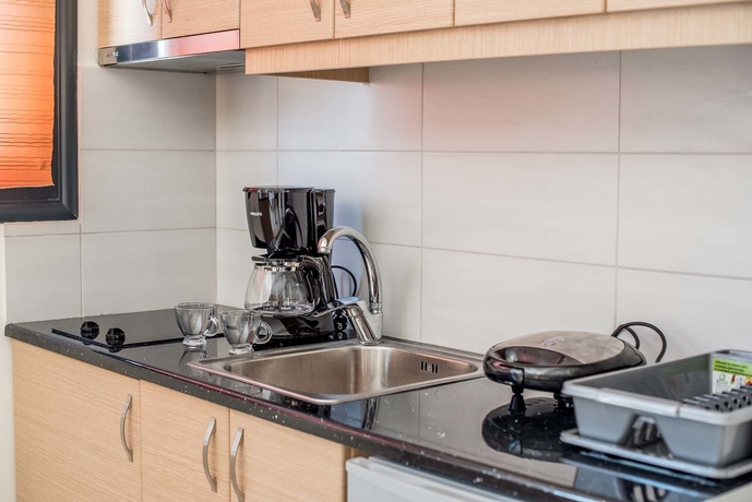 Imagen de la habitación del Hotel Golden Sun Villas. Foto 13