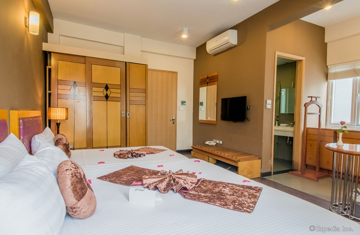 Imagen de la habitación del Hotel Golden Sunshine Villa and Travel. Foto 7