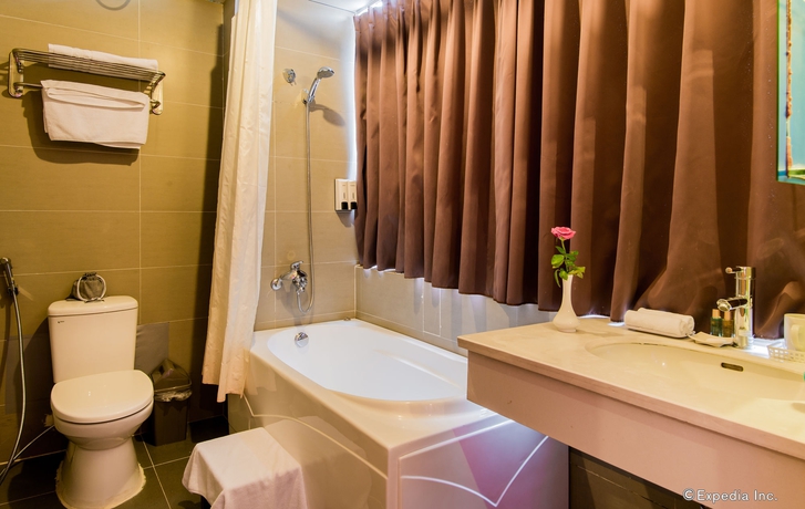 Imagen de la habitación del Hotel Golden Sunshine Villa and Travel. Foto 9