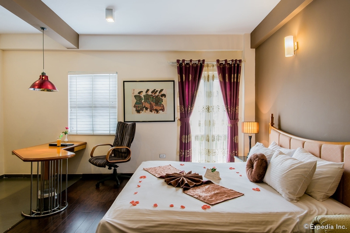 Imagen de la habitación del Hotel Golden Sunshine Villa and Travel. Foto 11