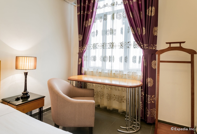 Imagen de la habitación del Hotel Golden Sunshine Villa and Travel. Foto 12