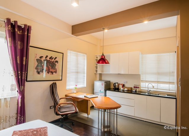 Imagen de la habitación del Hotel Golden Sunshine Villa and Travel. Foto 13