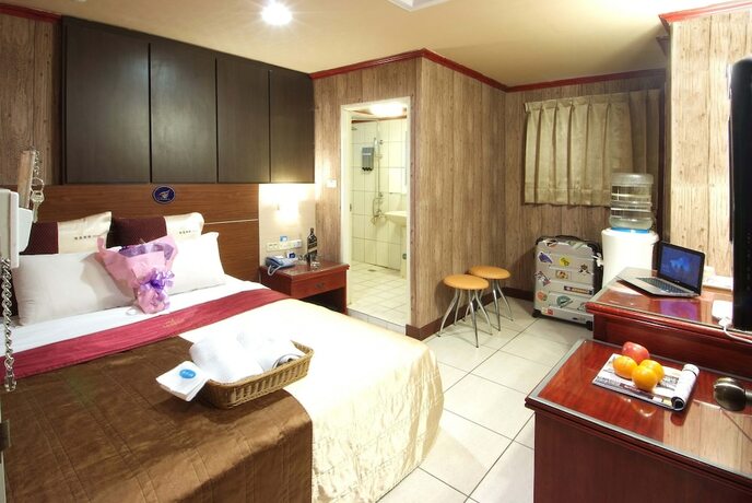 Imagen de la habitación del Hotel Golden Swallow. Foto 25