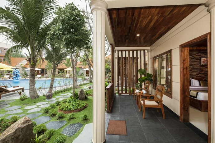 Imagen de la habitación del Hotel Golden Topaz Resort. Foto 12