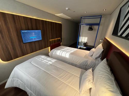 Imagen de la habitación del Hotel Golden Tower Express Na&ccedil;&otilde;es Unidas by F&ecirc;nix Hot&eacute;is. Foto 17