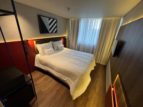 Imagen de la habitación del Hotel Golden Tower Express Na&ccedil;&otilde;es Unidas by F&ecirc;nix Hot&eacute;is. Foto 18