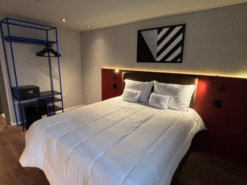 Imagen de la habitación del Hotel Golden Tower Express Na&ccedil;&otilde;es Unidas by F&ecirc;nix Hot&eacute;is. Foto 19