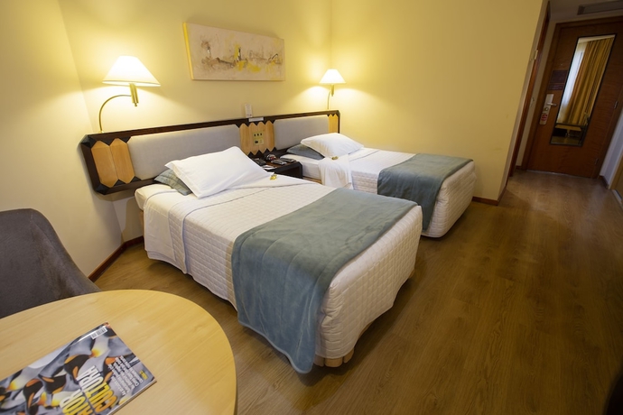 Imagen de la habitación del Hotel Golden Tower Pinheiros By Fênix Hotéis. Foto 6