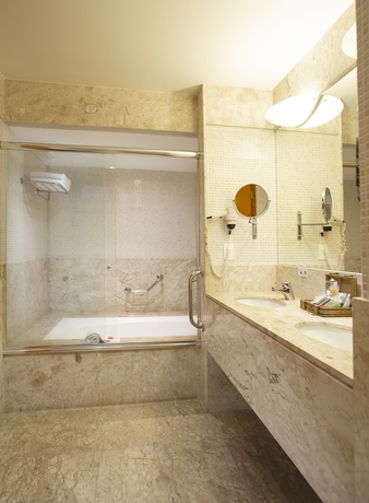 Imagen de la habitación del Hotel Golden Tower Pinheiros By Fênix Hotéis. Foto 9