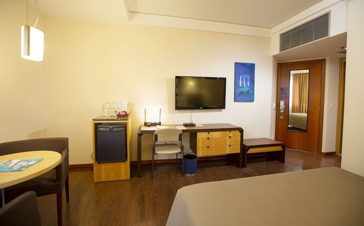 Imagen de la habitación del Hotel Golden Tower Pinheiros By Fênix Hotéis. Foto 13