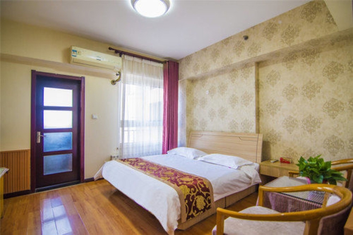 Imagen de la habitación del Hotel Golden Tree Business. Foto 2