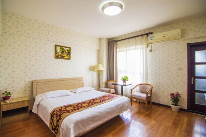 Imagen de la habitación del Hotel Golden Tree Business. Foto 5