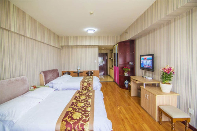 Imagen de la habitación del Hotel Golden Tree Business. Foto 6