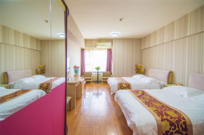 Imagen de la habitación del Hotel Golden Tree Business. Foto 11