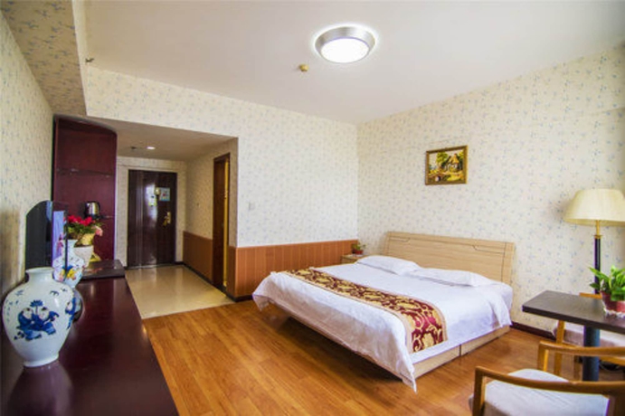 Imagen de la habitación del Hotel Golden Tree Business. Foto 13