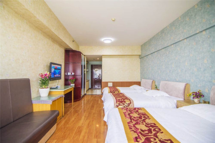 Imagen de la habitación del Hotel Golden Tree Business. Foto 14