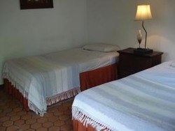 Imagen de la habitación del Hotel Golden Triangle Inn. Foto 3