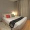 Imagen de la habitación del Hotel Golden Triangle Suites By Mondo. Foto 4