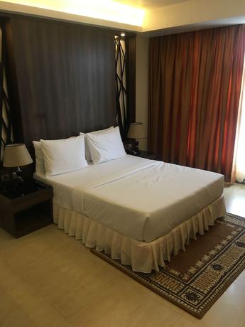 Imagen de la habitación del Hotel Golden Tulip Agulu Lake and Resort. Foto 8