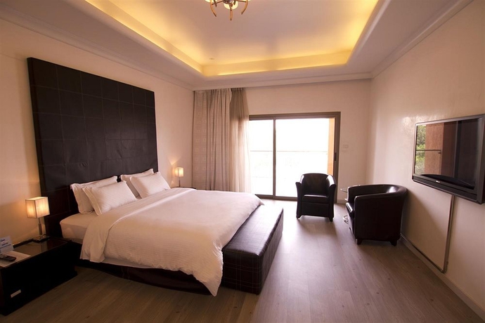 Imagen de la habitación del Hotel Golden Tulip Al Jazira. Foto 11