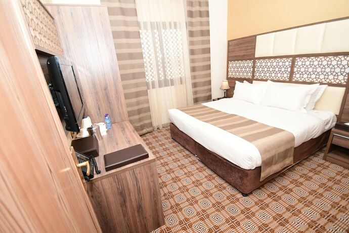 Imagen de la habitación del Hotel Golden Tulip Al Zahabi. Foto 5