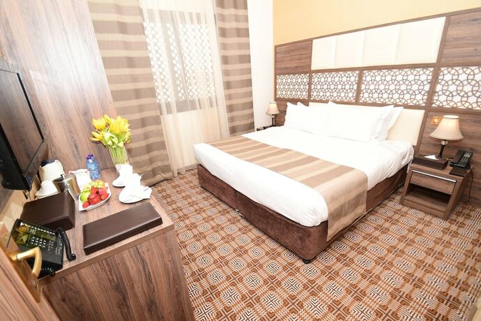 Imagen de la habitación del Hotel Golden Tulip Al Zahabi. Foto 9