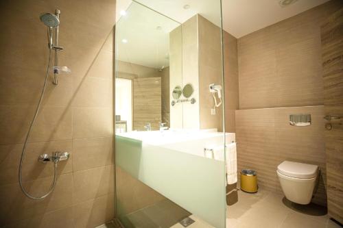 Imagen de la habitación del Hotel Golden Tulip Amman. Foto 14