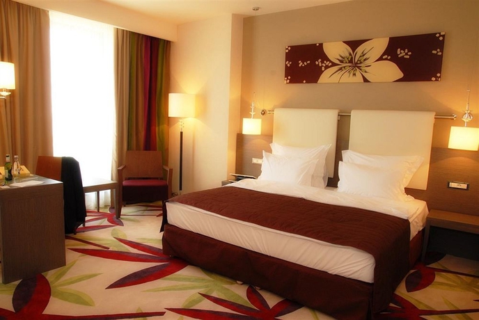 Imagen de la habitación del Hotel Golden Tulip Ana Dome. Foto 7