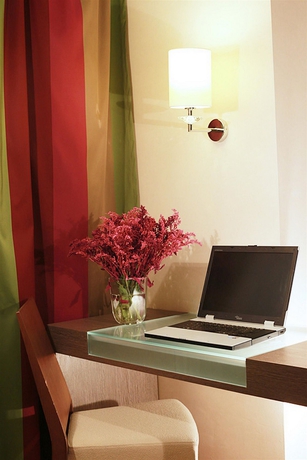 Imagen de la habitación del Hotel Golden Tulip Ana Dome. Foto 9