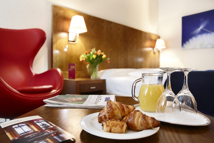 Imagen de la habitación del Hotel Golden Tulip Bielefeld City. Foto 7