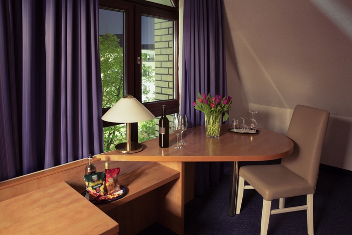 Imagen de los interiores del Hotel Golden Tulip Bielefeld City. Foto 14