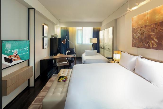 Imagen de la habitación del Hotel Golden Tulip Bund New Asia. Foto 16