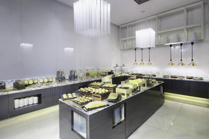 Imagen del bar/restaurante del Hotel Golden Tulip Bund New Asia. Foto 14