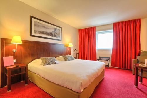Imagen de la habitación del Hotel Golden Tulip CDG Airport Roissy. Foto 18