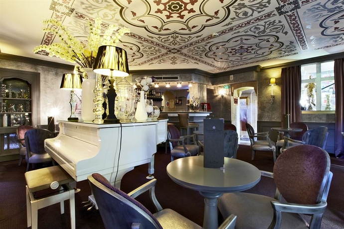 Imagen del bar/restaurante del Hotel Golden Tulip Cannes De Paris. Foto 4