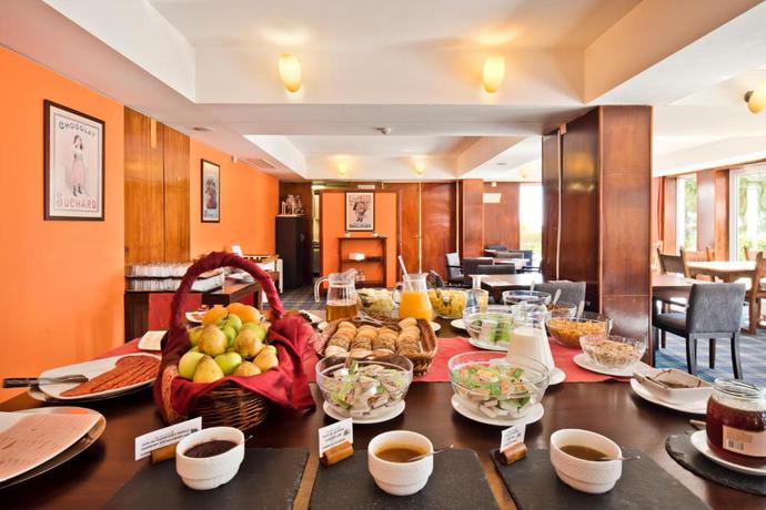 Imagen del bar/restaurante del Hotel Golden Tulip Caramulo. Foto 2