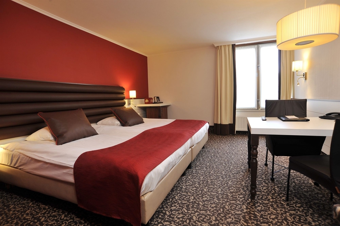 Imagen de la habitación del Hotel Golden Tulip Central. Foto 11