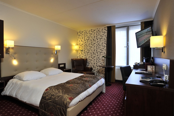 Imagen de la habitación del Hotel Golden Tulip Central. Foto 12