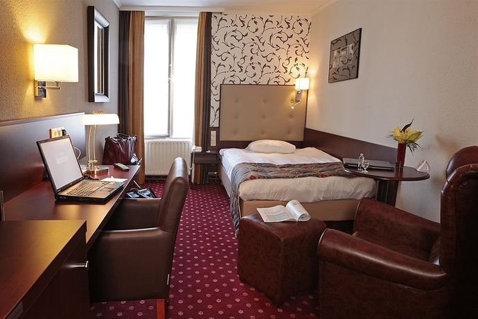 Imagen de la habitación del Hotel Golden Tulip Central. Foto 13