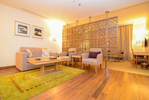 Imagen de la habitación del Hotel Golden Tulip Dammam Corniche. Foto 8