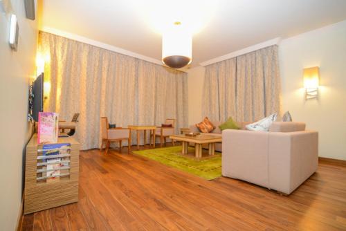 Imagen de la habitación del Hotel Golden Tulip Dammam Corniche. Foto 10