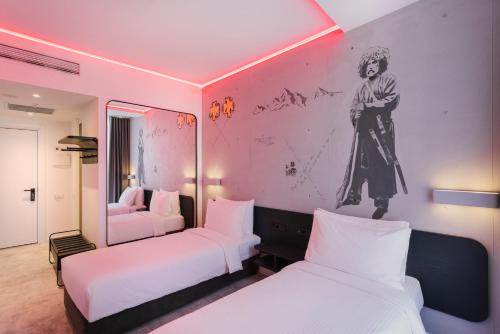 Imagen de la habitación del Hotel Golden Tulip Design Tbilisi. Foto 16