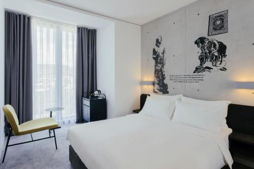 Imagen de la habitación del Hotel Golden Tulip Design Tbilisi. Foto 17