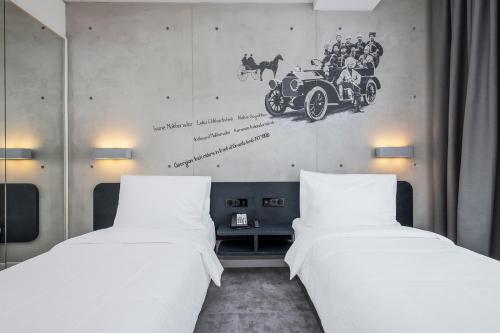 Imagen de la habitación del Hotel Golden Tulip Design Tbilisi. Foto 18